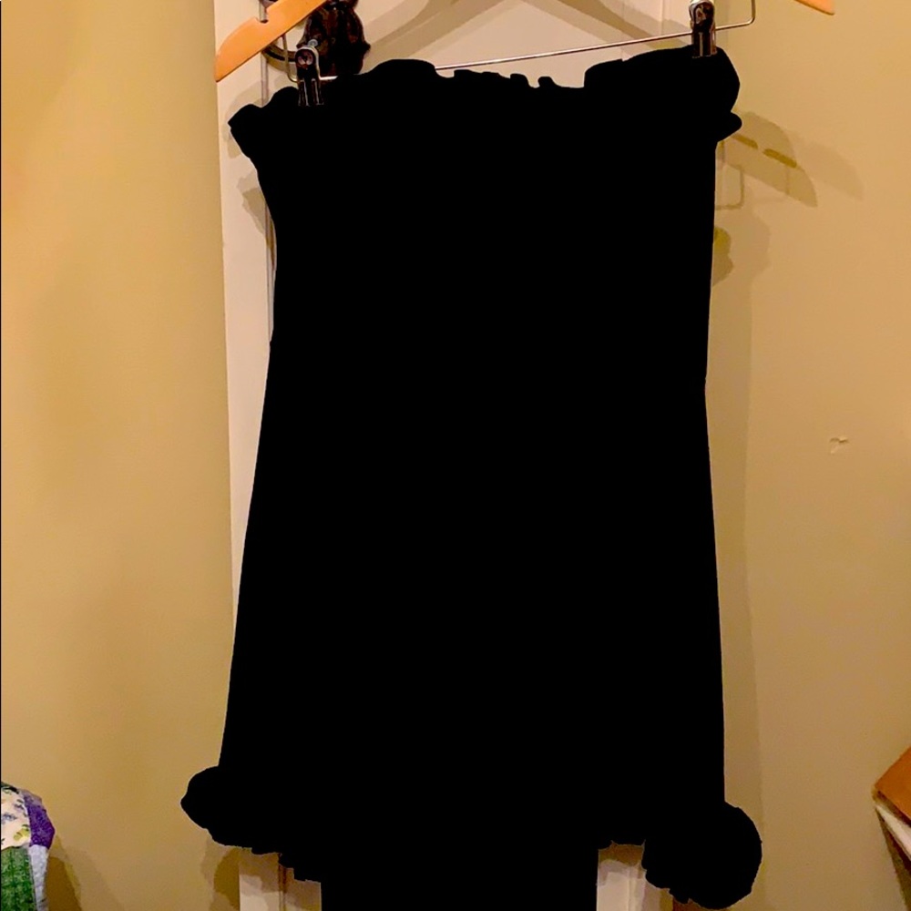 Black ruffled sleeveless mini formal.
